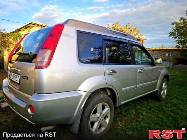 Серый Ниссан ИксТрейл, объемом двигателя 2 л и пробегом 208 тыс. км за 7300 $, фото 1 на Automoto.ua