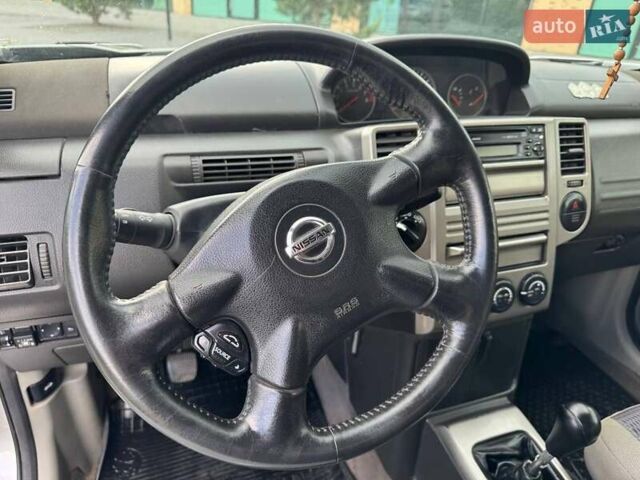 Серый Ниссан ИксТрейл, объемом двигателя 2 л и пробегом 209 тыс. км за 6800 $, фото 21 на Automoto.ua