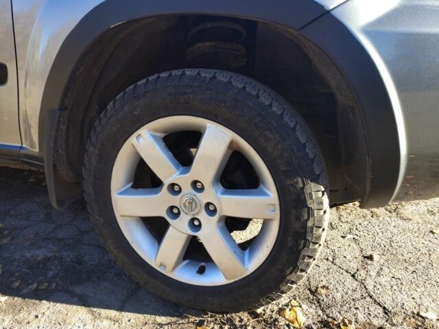 Серый Ниссан ИксТрейл, объемом двигателя 2.2 л и пробегом 286 тыс. км за 6000 $, фото 2 на Automoto.ua