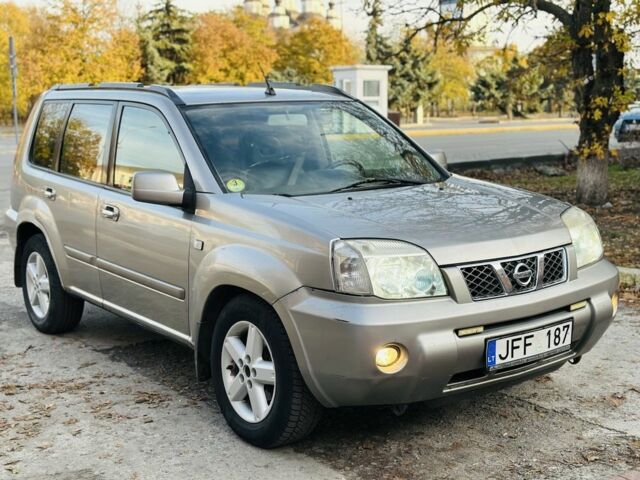 Серый Ниссан ИксТрейл, объемом двигателя 2.2 л и пробегом 280 тыс. км за 3400 $, фото 5 на Automoto.ua