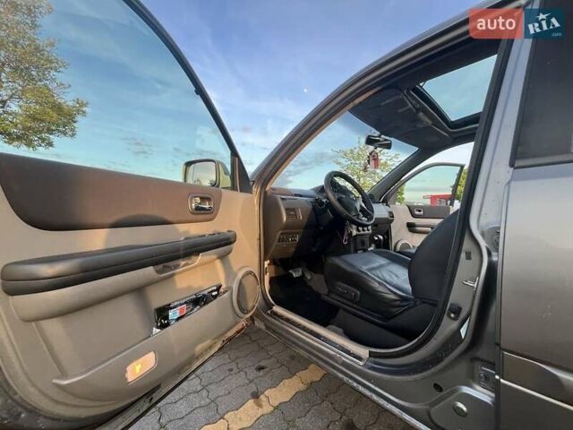 Серый Ниссан ИксТрейл, объемом двигателя 2.5 л и пробегом 360 тыс. км за 6417 $, фото 22 на Automoto.ua