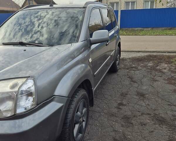 Серый Ниссан ИксТрейл, объемом двигателя 2.2 л и пробегом 383 тыс. км за 6000 $, фото 9 на Automoto.ua