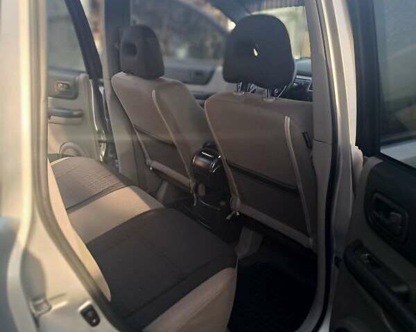 Сірий Ніссан ІксТрейл, об'ємом двигуна 2.18 л та пробігом 208 тис. км за 7200 $, фото 13 на Automoto.ua