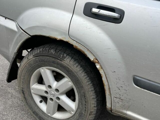 Сірий Ніссан ІксТрейл, об'ємом двигуна 2.2 л та пробігом 318 тис. км за 2500 $, фото 4 на Automoto.ua