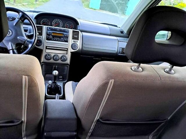 Серый Ниссан ИксТрейл, объемом двигателя 2 л и пробегом 214 тыс. км за 6585 $, фото 13 на Automoto.ua