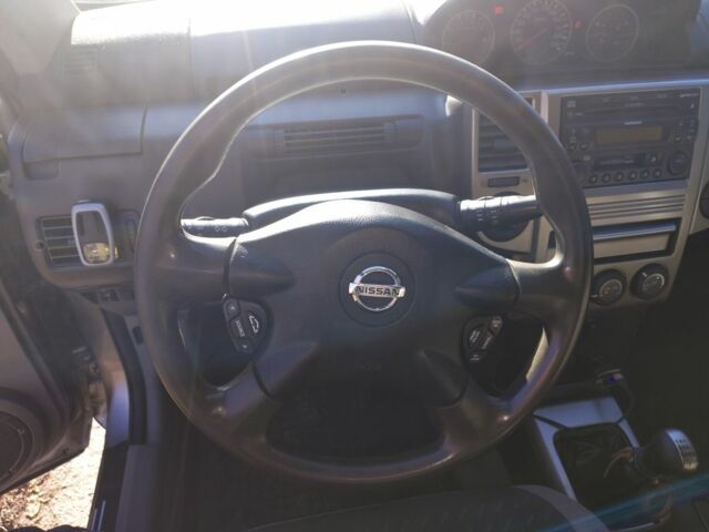 Серый Ниссан ИксТрейл, объемом двигателя 2.2 л и пробегом 286 тыс. км за 6000 $, фото 12 на Automoto.ua