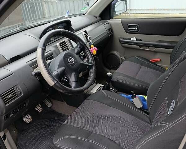 Сірий Ніссан ІксТрейл, об'ємом двигуна 2.49 л та пробігом 211 тис. км за 7500 $, фото 7 на Automoto.ua