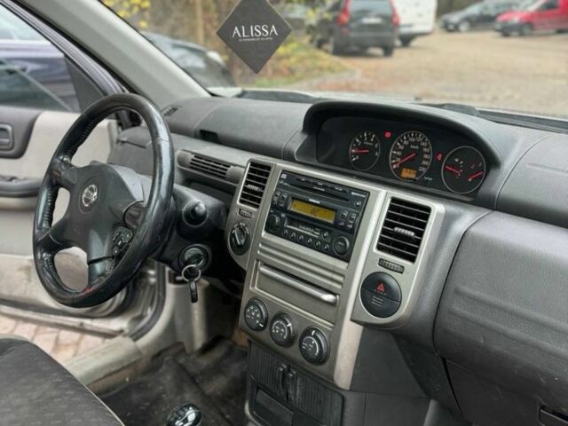 Серый Ниссан ИксТрейл, объемом двигателя 2.2 л и пробегом 191 тыс. км за 4600 $, фото 12 на Automoto.ua