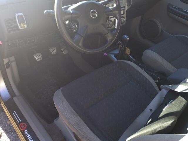 Серый Ниссан ИксТрейл, объемом двигателя 2.2 л и пробегом 286 тыс. км за 6000 $, фото 8 на Automoto.ua