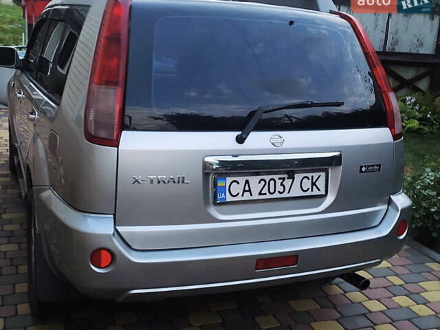 Сірий Ніссан ІксТрейл, об'ємом двигуна 2.49 л та пробігом 250 тис. км за 7500 $, фото 3 на Automoto.ua