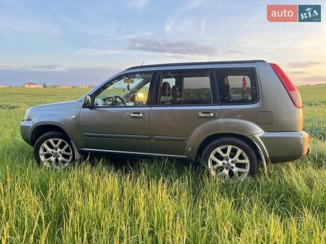 Серый Ниссан ИксТрейл, объемом двигателя 2.5 л и пробегом 360 тыс. км за 6417 $, фото 6 на Automoto.ua