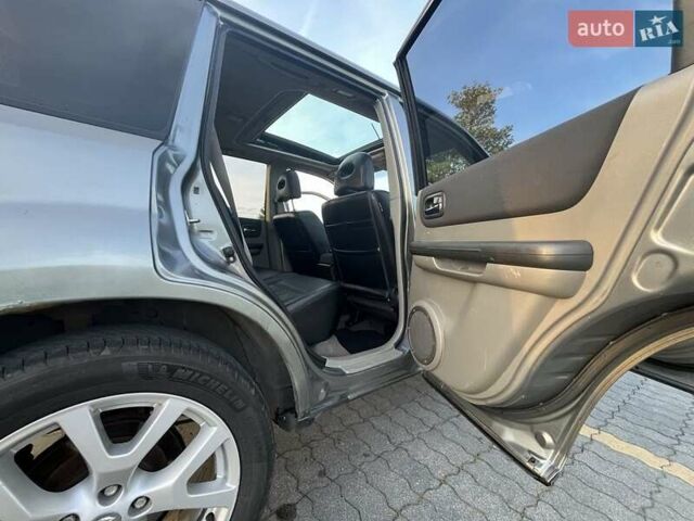 Серый Ниссан ИксТрейл, объемом двигателя 2.5 л и пробегом 360 тыс. км за 6417 $, фото 19 на Automoto.ua