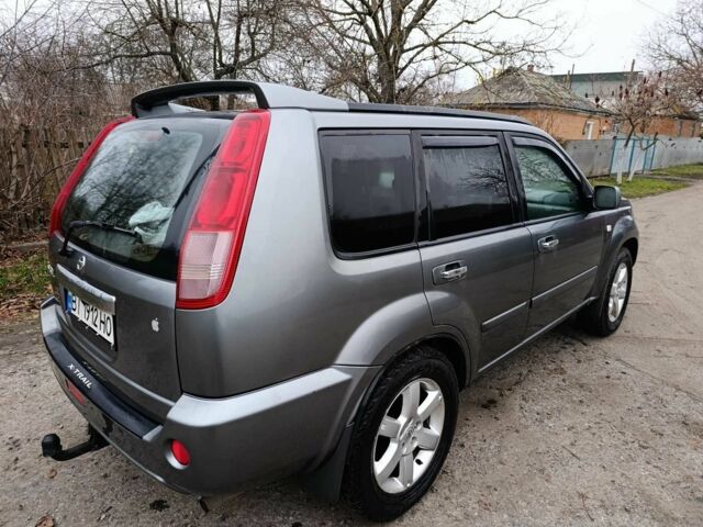 Сірий Ніссан ІксТрейл, об'ємом двигуна 2.5 л та пробігом 211 тис. км за 7500 $, фото 4 на Automoto.ua