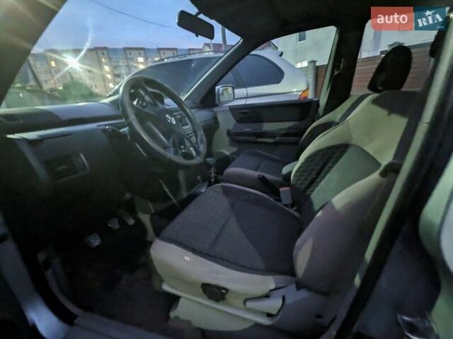 Серый Ниссан ИксТрейл, объемом двигателя 2.2 л и пробегом 305 тыс. км за 2850 $, фото 2 на Automoto.ua