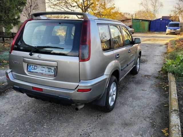 Сірий Ніссан ІксТрейл, об'ємом двигуна 1.9 л та пробігом 250 тис. км за 4300 $, фото 3 на Automoto.ua