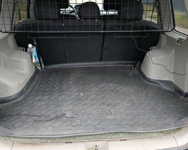 Сірий Ніссан ІксТрейл, об'ємом двигуна 2.49 л та пробігом 211 тис. км за 7500 $, фото 11 на Automoto.ua