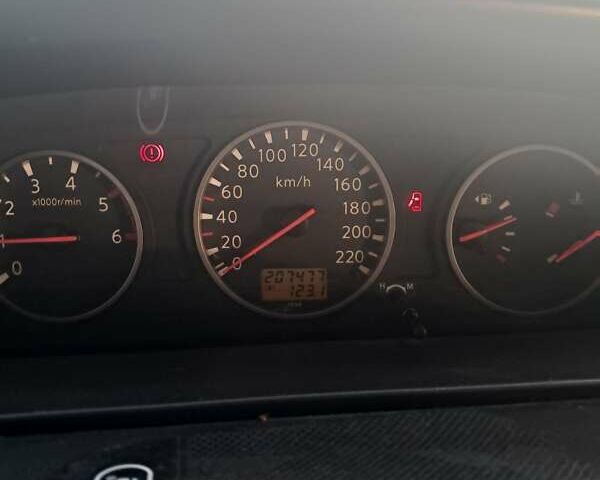 Сірий Ніссан ІксТрейл, об'ємом двигуна 2.18 л та пробігом 208 тис. км за 7200 $, фото 14 на Automoto.ua