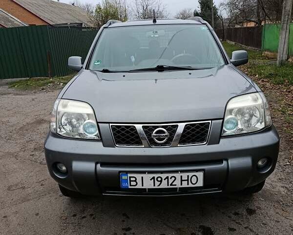 Сірий Ніссан ІксТрейл, об'ємом двигуна 2.49 л та пробігом 211 тис. км за 7500 $, фото 1 на Automoto.ua