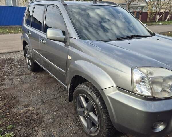 Серый Ниссан ИксТрейл, объемом двигателя 2.2 л и пробегом 383 тыс. км за 6000 $, фото 10 на Automoto.ua