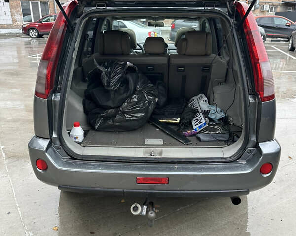 Серый Ниссан ИксТрейл, объемом двигателя 2.18 л и пробегом 308 тыс. км за 5100 $, фото 8 на Automoto.ua