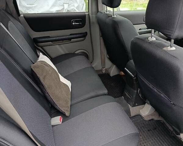 Сірий Ніссан ІксТрейл, об'ємом двигуна 2.49 л та пробігом 211 тис. км за 7500 $, фото 10 на Automoto.ua