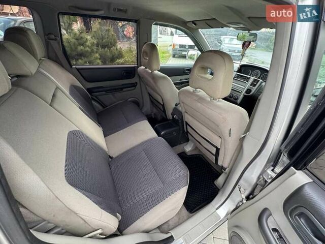Серый Ниссан ИксТрейл, объемом двигателя 2 л и пробегом 209 тыс. км за 6800 $, фото 14 на Automoto.ua