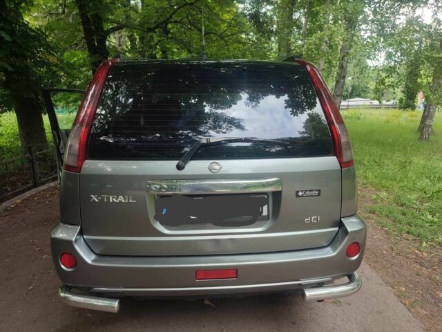 Серый Ниссан ИксТрейл, объемом двигателя 2.2 л и пробегом 300 тыс. км за 4900 $, фото 4 на Automoto.ua