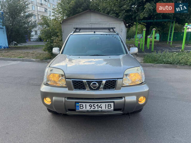 Серый Ниссан ИксТрейл, объемом двигателя 2 л и пробегом 283 тыс. км за 6500 $, фото 1 на Automoto.ua