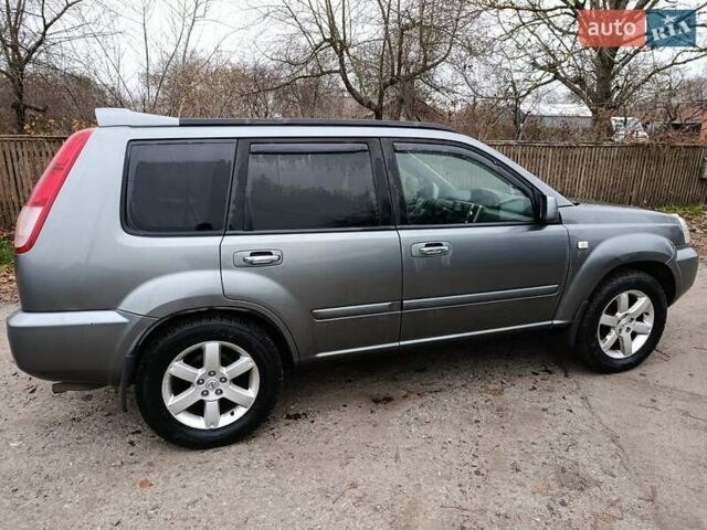 Сірий Ніссан ІксТрейл, об'ємом двигуна 2.49 л та пробігом 211 тис. км за 7500 $, фото 3 на Automoto.ua