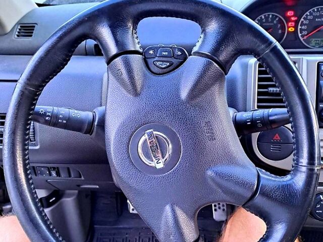 Серый Ниссан ИксТрейл, объемом двигателя 2 л и пробегом 214 тыс. км за 6585 $, фото 6 на Automoto.ua