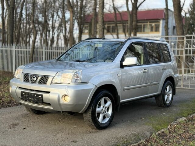Серый Ниссан ИксТрейл, объемом двигателя 2.2 л и пробегом 297 тыс. км за 4950 $, фото 2 на Automoto.ua
