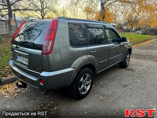 Серый Ниссан ИксТрейл, объемом двигателя 2.5 л и пробегом 333 тыс. км за 7100 $, фото 6 на Automoto.ua