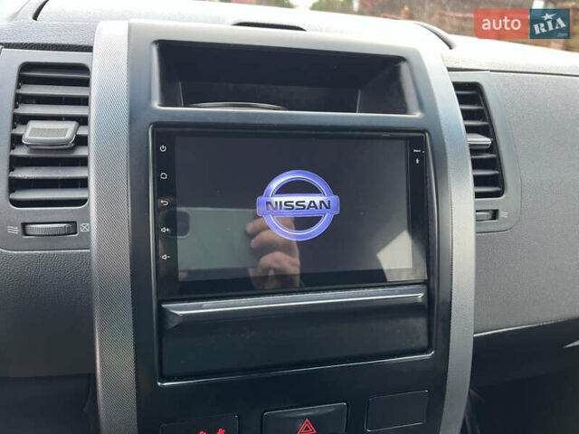 Серый Ниссан ИксТрейл, объемом двигателя 2.49 л и пробегом 155 тыс. км за 8499 $, фото 26 на Automoto.ua