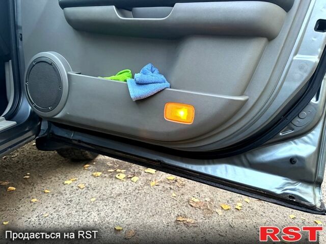 Серый Ниссан ИксТрейл, объемом двигателя 2.5 л и пробегом 333 тыс. км за 7100 $, фото 12 на Automoto.ua