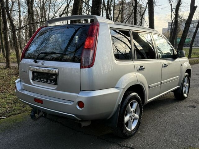 Серый Ниссан ИксТрейл, объемом двигателя 2.2 л и пробегом 297 тыс. км за 4950 $, фото 5 на Automoto.ua