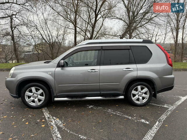 Сірий Ніссан ІксТрейл, об'ємом двигуна 2 л та пробігом 239 тис. км за 8200 $, фото 6 на Automoto.ua