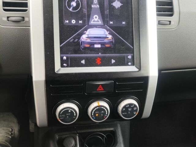 Сірий Ніссан ІксТрейл, об'ємом двигуна 2 л та пробігом 231 тис. км за 8200 $, фото 4 на Automoto.ua