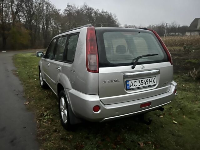 Серый Ниссан ИксТрейл, объемом двигателя 2.2 л и пробегом 267 тыс. км за 4400 $, фото 4 на Automoto.ua