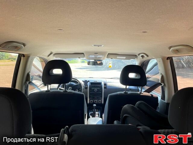 Серый Ниссан ИксТрейл, объемом двигателя 2.5 л и пробегом 270 тыс. км за 9800 $, фото 4 на Automoto.ua