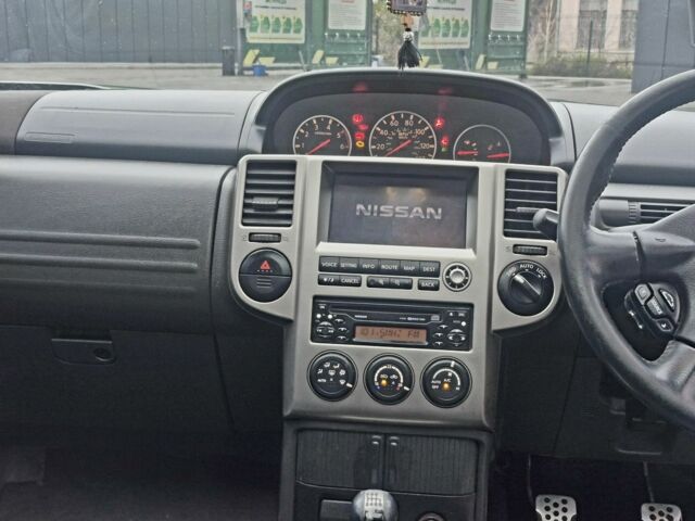 Серый Ниссан ИксТрейл, объемом двигателя 2 л и пробегом 160 тыс. км за 3550 $, фото 8 на Automoto.ua