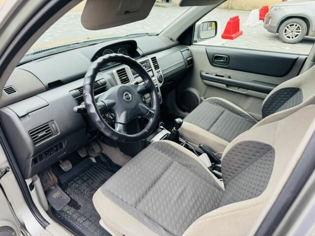 Серый Ниссан ИксТрейл, объемом двигателя 2.2 л и пробегом 170 тыс. км за 4250 $, фото 12 на Automoto.ua