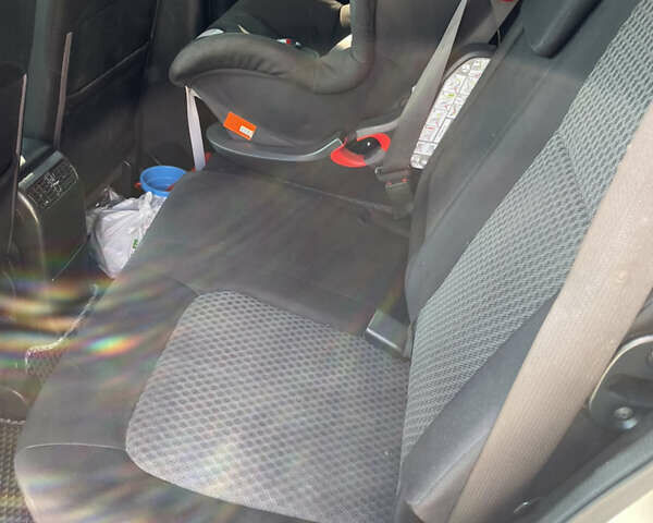 Серый Ниссан ИксТрейл, объемом двигателя 2.49 л и пробегом 248 тыс. км за 9800 $, фото 4 на Automoto.ua