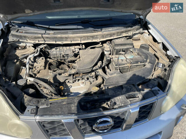 Серый Ниссан ИксТрейл, объемом двигателя 2.49 л и пробегом 248 тыс. км за 9800 $, фото 12 на Automoto.ua