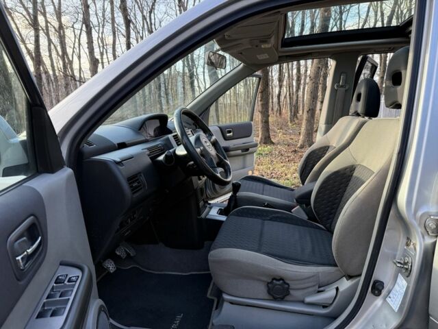 Серый Ниссан ИксТрейл, объемом двигателя 2.2 л и пробегом 297 тыс. км за 4950 $, фото 14 на Automoto.ua