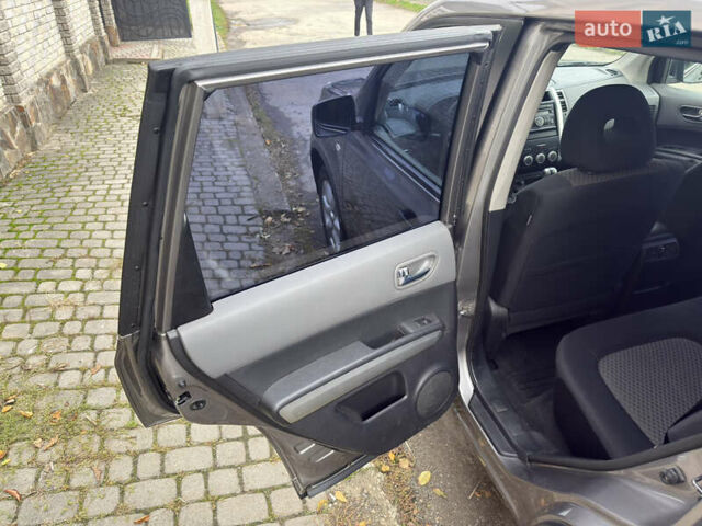 Серый Ниссан ИксТрейл, объемом двигателя 2 л и пробегом 159 тыс. км за 10000 $, фото 13 на Automoto.ua