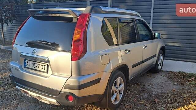 Сірий Ніссан ІксТрейл, об'ємом двигуна 2.49 л та пробігом 327 тис. км за 12000 $, фото 23 на Automoto.ua