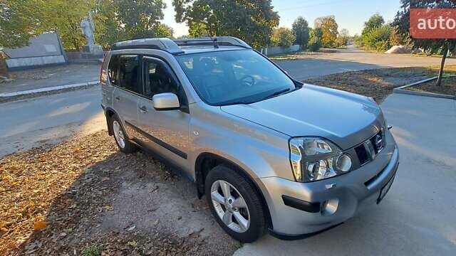 Сірий Ніссан ІксТрейл, об'ємом двигуна 2.49 л та пробігом 327 тис. км за 12000 $, фото 28 на Automoto.ua