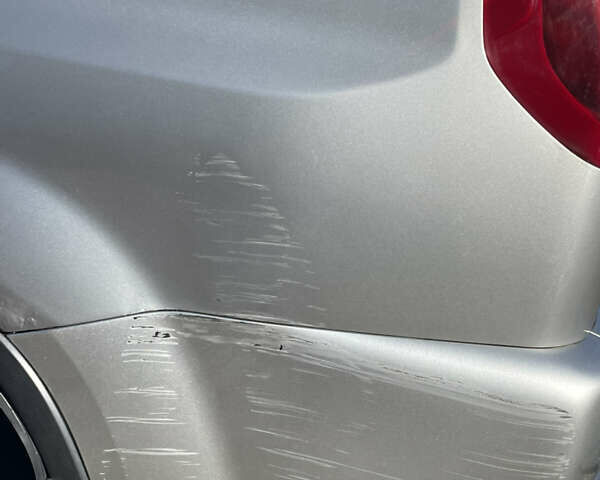 Серый Ниссан ИксТрейл, объемом двигателя 2 л и пробегом 340 тыс. км за 9500 $, фото 4 на Automoto.ua