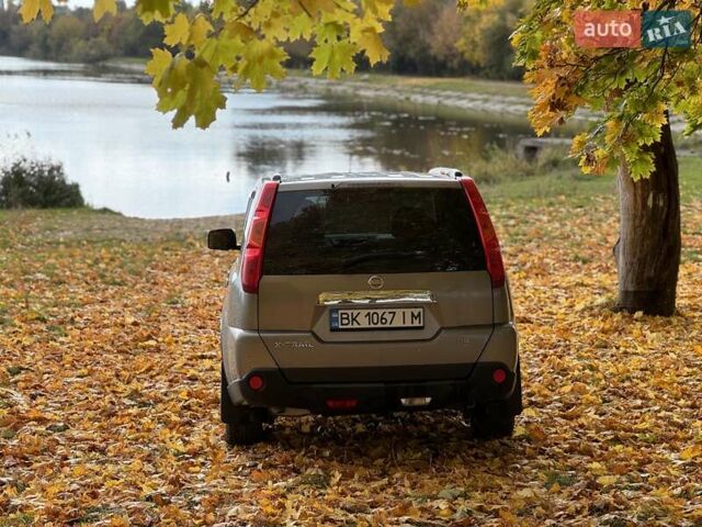 Сірий Ніссан ІксТрейл, об'ємом двигуна 2 л та пробігом 238 тис. км за 9400 $, фото 11 на Automoto.ua