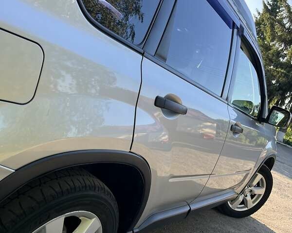 Серый Ниссан ИксТрейл, объемом двигателя 2.49 л и пробегом 195 тыс. км за 9800 $, фото 15 на Automoto.ua